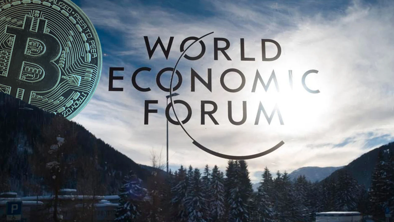 Bitcoin discussed as an anti-dollar hedge during the World Economic Forum in Davos 2026 amid global economic uncertainty